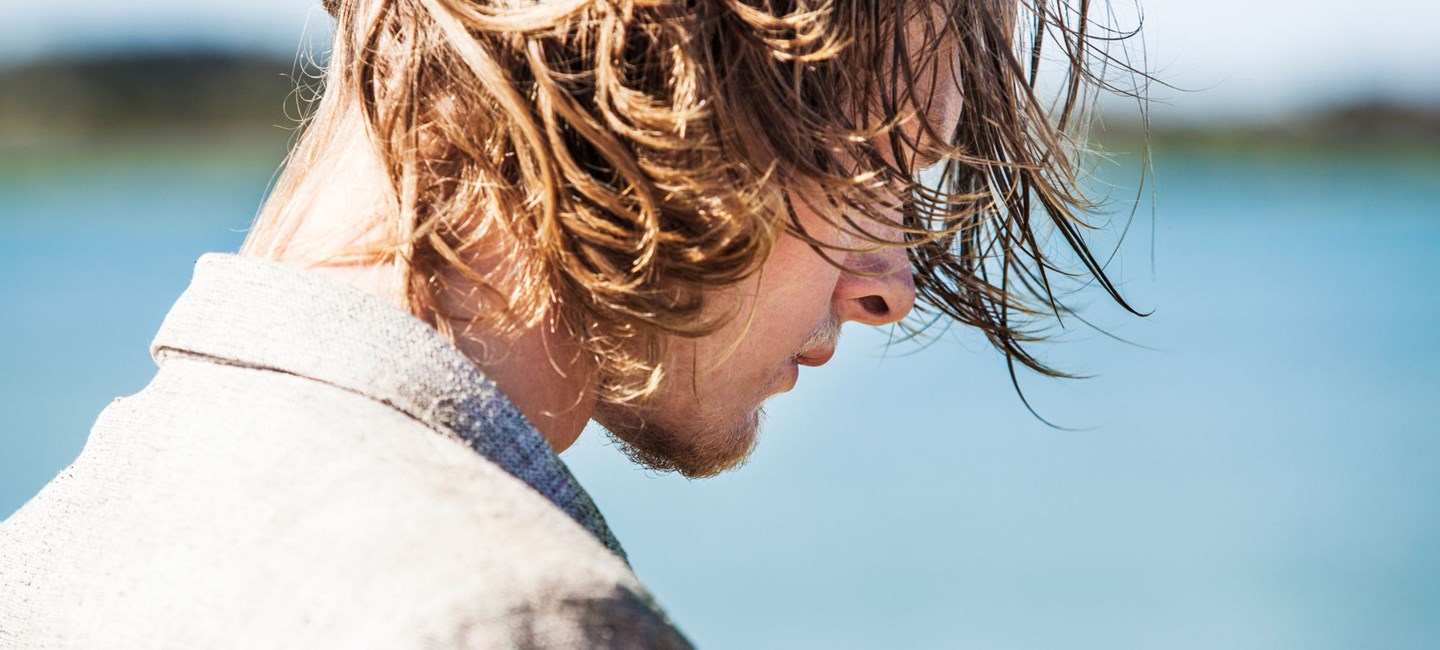 A picture containing outdoor, sky, water, person