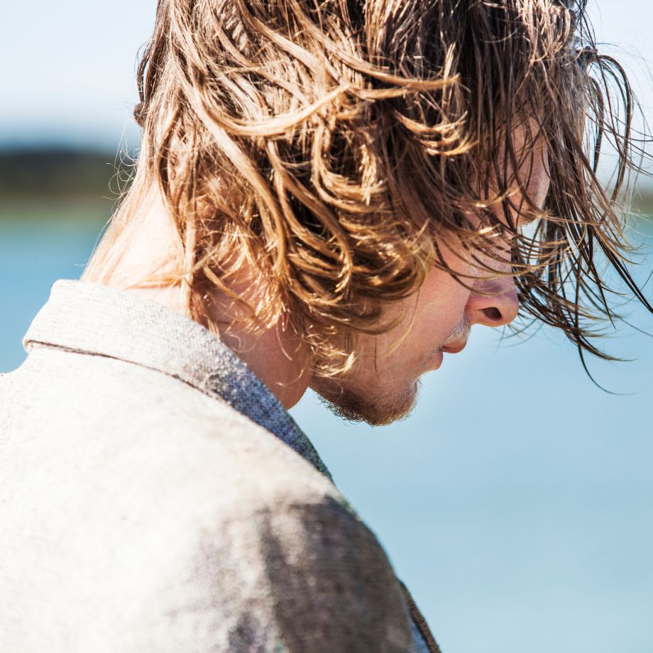 A picture containing outdoor, sky, water, person